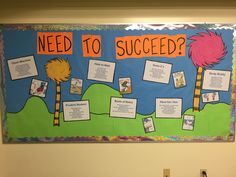 a bulletin board that has been decorated with pictures and information about what needs to be successful