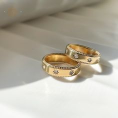 Gold Celestial Ring, Sun Rings, Water Proof Rings, 18K Gold Plated Jewelry, Celestial Simple Band, Gifts for Her, Celestial Jewelry, Gift. 💟 Material: Premium 316L Stainless Steel -18K Gold Plated. 💟 Gemstones: High-quality 3A Zircon Crystals 💟 Sizes: Available in US sizes 6, 7, 8 💟 Weight: Lightweight at just 3 grams 💟 Finish: Tarnish-free and hypoallergenic, ensuring long-lasting shine and comfort. 💫 Elegant Design: The classic gold finish paired with dazzling zircon crystals makes this ring a standout accessory. 💫 Durability: Made from high-quality stainless steel, it resists tarnishing and maintains its luster. 💫 Comfortable Fit: Lightweight and hypoallergenic, suitable for sensitive skin. 💫 Versatile: Perfect for everyday wear, whether at work, the gym, or a night out. Celestial Wedding Ring With Bezel Setting, Gold Celestial Rings For Anniversary, Celestial Tarnish-resistant Rings For Anniversary, Gold Celestial Diamond Ring, Celestial Style Gold Round Rings, Gold Jewelry With Halo Design For Promise, Gold Couple Rings With Diamond Accents For Wedding, Gold Halo Design Jewelry For Promise, Gold Wedding Couple Rings With Diamond Accents