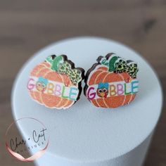 Style: Thanksgiving earrings Features: These are rustic and wooden earrings featuring a pumpkin, Gobble, and leopard print bow. Very cute for fall! Size: about 5/8" by 5/8", see photo for scale Color: orange Orders are shipped within 1-2 business days. General jewelry care - keep the item dry and away from moisture. All photos are owned by Char + Cait Boutique and are prohibited from being used without permission. Thanksgiving Earrings, Orange Order, Leopard Print Bow, Football Earrings, Ear Crawler Earrings, Pumpkin Thanksgiving, Crawlers Earrings, Ear Pins, Dragonfly Earrings