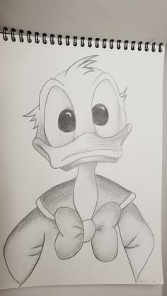 a drawing of a ducky with big eyes and an angry look on his face