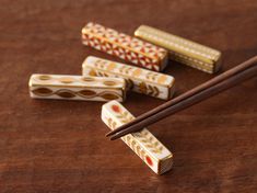 chopsticks and matchesticks on a wooden table