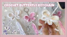 the crochet butterfly keychain is made with yarn and beads, which are pink and white