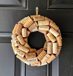 a wine cork wreath hanging on the front door