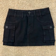 Brand New, Never Worn Mini Skirt In Black. Ordered A Medium And It’s Definitely A Small Y2k Style Black Skirt With Pockets, Black Y2k Skort With Pockets, Y2k Black Skort With Pockets, Black Cotton Mini Cargo Skirt, Black Casual Skort With Pockets, Casual Black Skort With Pockets, Amazon Casual Fitted Skirt, Casual Fitted Skirt By Amazon, Amazon Casual Black Bottoms