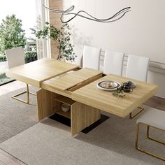 a dining room table with white chairs and a bowl of food on the centerpiece