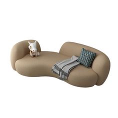 a couch with a stuffed animal sitting on top of it's backrests