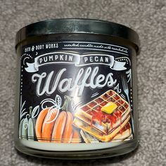 a jar of pumpkin pecan waffles sits on the floor