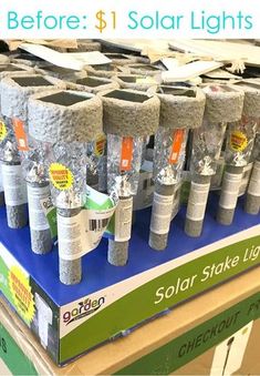 there are many solar lights on display in the store for $ 1 00 each or more