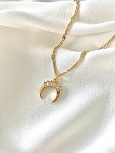 **Each piece in my shop, I personally create and photograph. (All photos are property of The Cord Gallery LLC) Thank you for supporting my small business.Dainty Gold Filled Crescent Moon Pendant with Crystals NecklaceThis dainty, gold necklace is so pretty and very on trend!Features a dainty Gold Filled Crescent Moon pendant, adorned with sparkly baguette crystals. Hangs on your choice of gold filled chain. *Pendant Size: 18.7mm x 13.7mmChain Options:Gold Filled Cable ChainGold Filled Box ChainG Crescent Necklace, Crescent Moon Pendant, Moon Pendant Necklace, Dainty Gold Necklace, Crystal Necklace Pendant, Moon Pendant, Chain Pendant, Pretty Jewellery, Gold Filled Chain