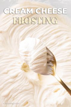 a spoon full of cream cheese frosting