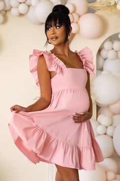 We just love this dreamy, ultra-feminine babydoll style maternity mini, babe. Expertly crafted in a delicate luxe woven fabric, our "Dolly Daze" mini dress is the epitome of girl-next-door chic. Super girly with a vintage feel, this style will make you well ahead of the fashion pack with its statement ruffle sleeves, bust-flattering neckline and thigh-skimming hem. Where to WearPerfect for your baby shower, weddings, date nights, and relaxing picnics with bae. We also love this dress for festivals. Style WithRock the festival look by teaming this dress with a floppy hat and oversized sunnies. Also looks gorge with strappy heels or flat sandals. Up the glam factor by adding delicate jewellery and a sparkly clutch. Underwear SolutionsLace Be Honest nipple coversProduct DetailsModel is 5’9 an Girly Maternity Outfits, Vestidos Para Baby Shower, Sparkly Clutch, Delicate Jewellery, Babydoll Mini Dress, Baby Shower Dresses, Babydoll Style, Ultra Feminine, Shower Dresses