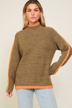 This cozy masterpiece offers relaxed vibes with its raglan sleeves, plus a snug funnel neck and a side slit for stylish movement. We added subtle orange stripes for a colorful punch, plus top-notch materials for softness, warmth, and comfort. Dress it down with jeans and leggings or amp up the look with a skirt and boots Fabric Contents: 74% Polyester, 15% Nylon, 6% Wool, 5% Spandex Care Instructions: Machine wash cold, gentle cycle, tumble dry low. Size Measurement (inch): S: 22.5 (Bust), 26.0 Winter Wishlist, Raglan Sleeve Sweater, Soft Orange, Funnel Neck Sweater, Raglan Sweater, Cozy Fabric, Sweater Fits, Orange Fabric, Warm Sweaters