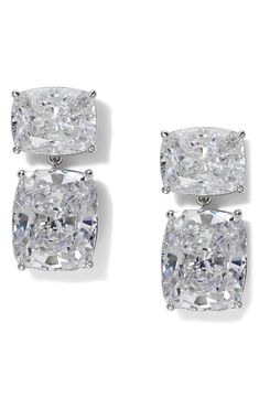 Sparkling cubic zirconia stones evoke the romantic glow of the Northern Lights on these hand-polished drop earrings that add a flash of glamour to your evening look. 7/8" drop; 9.5mm width 18k-gold plate or rhodium plate/cubic zirconia Imported Embroidered Cocktail Dress, High Waist Wide Leg Jeans, Modern Luxe, Ice Box, Keep Jewelry, Skin Care Women, Fine Jewellery Earrings, Cz Stone, Fashion Help