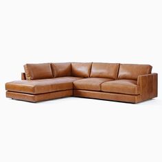 a brown leather sectional sofa on a white background