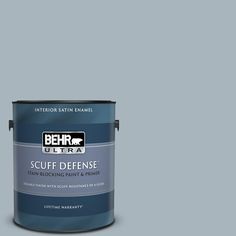 a blue paint can with the words behr ultra on it's bottom corner