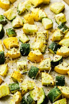 a pizza with zucchini, squash and parmesan cheese on the top