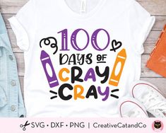 a t - shirt with the words 100 days of crayon on it next to some