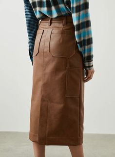 This workwear-inspired skirt is the ultimate addition to your winter wardrobe. Made from pre-tarnished faux leather and complete with eye-catching pocket details, this style pairs well with a sweater and boots I Feel Pretty, Pocket Detail, Winter Wardrobe, Skirt Length, Work Wear, Faux Leather, Boutique, Skirt, Wardrobe