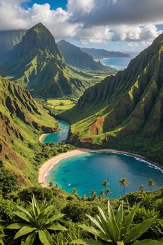 an aerial view of the ocean and mountains in hawaii, with palm trees on either side