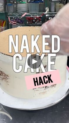 a cake that has been baked and is being held up by someone's hand