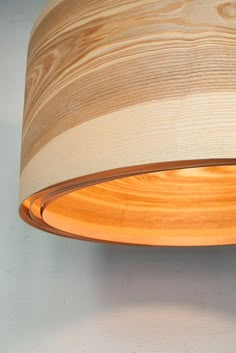 a wooden light hanging from the ceiling