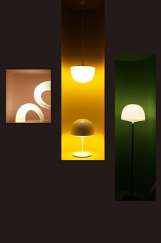 three different lamps are lit up against a dark background, one is yellow and the other is green