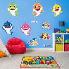 a child's room with various wall decals and toys on the carpeted floor