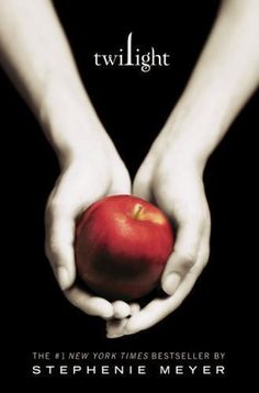 a book cover with two hands holding an apple in front of the title twilight by stephanie mayer