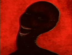 an image of a creepy looking person with red background