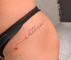 a woman's stomach with the word intensus written in cursive writing