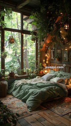 an unmade bed in front of a large window with plants hanging from it's sides