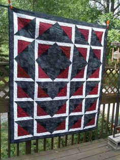 an image of a quilt that is being displayed on the webpage for sale, and it