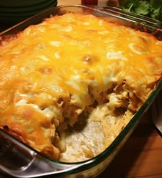 a casserole dish with meat and cheese in it