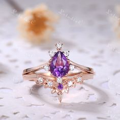 This is a amethyst engagement ring set in rose gold. The stones are natural amethyst and VVS man made cz diamond. The amethyst is about 5x7mm pear shaped cut The stones can be replace with other gemstones.For example,if you don't like the CZ accent,you can ask me replace it with tourmaline,aquamarine,diamond,emerald,sapphire... For custom making jewelry,it can be made in 2 different metal. 1,Solid gold,including 14/18k white/rose/yellow gold. 2,925 sterling silver with white/yellow/rose gold pla Amethyst And Pearl Ring, Walburga Black, Gemstone Rings Unique, Amethyst Wedding Rings, Gold Amethyst Ring