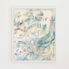 an abstract painting with blue and white colors on the wall next to a framed object