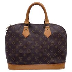 Inspired by the shape invented in the 30s by Gaston Vuitton, the ALMA by LOUIS VUITTON is a classic of the House. Double top handle carried, this bag is crafted in timeless monogram canvas. The inside is lined with brown canvas lining and it has 1 open pocket inside. Cowhide leather handles and bottom. 'LOUIS VUITTON Paris - Made in France' engraved on the side. Retail price is 1650 Euros Condition B - VERY GOOD Many signs of wear of use on the bottom (darkness and scratches).Some darkness on th Louis Vuitton Top, Louis Vuitton Paris, Louis Vuitton Vintage, Leather Weekender Bag, Alma Pm, Leather Weekender, Vintage Monogram, Lv Monogram, Vintage Louis Vuitton