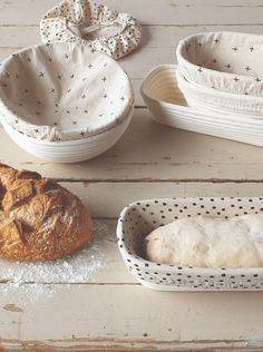 bread and other baking supplies on a wooden table