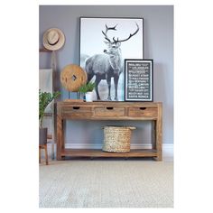 Natural wood grain accents add rustic appeal to this classic, wooden console table. Crafted with gorgeous sheesham wood, it's a sturdy and stylish addition to any home. Three slide-out drawers on wooden glides offer versatile storage space. A spacious open shelf down below adds even more convenience. Place this wooden console table in an entryway or den to add charm and personality to your decor. Rustic Wood Console Table, Wood Console Table With Drawers, Storage Console Table, 3 Drawer Storage, Sofa Console, Storage Console, Console Table With Drawers, Wooden Console Table, Wooden Console