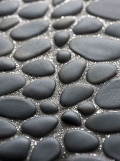 some black rocks and water droplets on top of each other with the caption beach house remodel