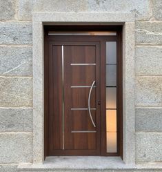 a wooden door with glass on the outside