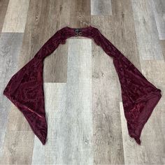 Nwot Dolls Kill Burgundy Shrug.A Luxurious Deep Burgundy Velvet Crop Top With A Rich Texture And An Ornate Metal Clasp At The Center. Measurements Are As Follows Arms From Shoulder 26” Bust 24-26 Pit To Shoulder 6.5 Honestly, Just The Hardware If You Don’t Wear An Extra Extra Small Is Very Unique . Crop Top With Shrug, Shrug Outfits, East Asian Fashion, Embellished Crop Top, Mardi Gras Outfits, Lavender Aesthetic, Velvet Crop Top, Gothic Clothes, Burgundy Velvet