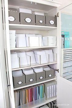 an organized closet filled with files and folders