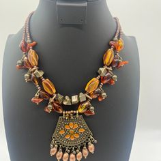 Double Layered Floral Medallion Adjustable Chain Hook Closure Mocha Brand Festival Brown Polished Bead Necklaces, Festival Brown Polished Bead Necklace, Festival Brown Polished Beads Necklace, Beaded Brown Necklaces, Brown Beaded Necklaces, Beaded Statement Necklace, Stone Pendant, Stone Pendants, Mocha