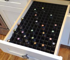 "This 3D printed custom-made essential oil organizer is made to fit any drawer or space. Simply measure the width and depth of the space and we will make the organizer fit it perfectly (make sure it can accommodate about 2.75\" of oil container height). Organize your oils and maximize your space! Most 5 mL, 10 mL and 15 mL oil containers will fit (including doTERRA, Rocky Mountain Oils, Plant Therapy, Young Living, etc.). The exact slot size will be adjusted to maximize usage of your space, but Essential Oil Drawer Storage, Essential Oil Organizer, Essential Oil Organization, Essential Oil Organization Storage, Essential Oil Display, Essential Oil Storage Ideas, Wabi Sabi Texture, Essential Oils Organization, Spice Organization Drawer