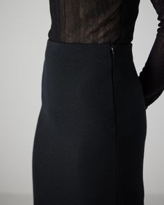 Our easy tube skirt in a compact merino wool, perfect to pair with the matching Zoe Top as a chic set. Evening Fall Pencil Skirt, Office Wool Skirt In Black, Elegant Black Elastane Mini Skirt, Formal Black Wool Skirt, Modern Black Pencil Mini Skirt, Black Elastane Pencil Skirt For Evening, Elegant Stretch Mini Skirt For Winter, Elegant Fitted Wool Skirt, Modern Fitted Pencil Skirt For Fall