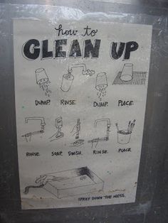 a sign that is on the side of a building with instructions for how to clean up