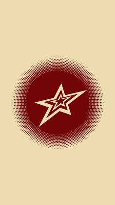 a red and white star on a beige background