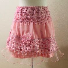 Girly Pink Skirt With Ruffles And Detail Cute Summer Party Skirt, Feminine Ruffled Skort For Party, Spring Party Skort, Cute Ruffled Skort For Party, Cute Party Skort With Ruffles, Cute Party Skort In Mini Length, Pink Skirted Skort For Party, Pink Party Skort With Skirted Shape, Cute Mini Length Skort For Party