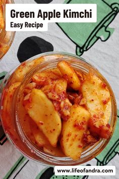 green apple kimchi recipe in a glass bowl on top of a tablecloth with the words, green apple kimchi easy recipe