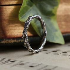 Meet the latest addition to our enchanting Silvestre stacking collection. It is meticulously designed to seamlessly blend with your current Dixi stack or stand out as a statement ring on its own. With its tightly bound Hawthorne branches, this latest addition brings a touch of nature with a gothic twist to your stacking ring collection. MaterialSterling Silver SizingHeight - 2mm Silver Gothic Rings, Witchy Rings Jewelry, Witchy Rings Aesthetic, Gothic Silver Metal Rings, Witchy Rings Silver, Crown Of Thorns Ring, Thorns Ring, Thorn Crown, Thorn Ring